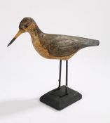 Early 20th Century Shorebird decoy, with a long beak and carved wings and painted body, 31cm long