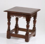 Late Elizabethan / James I Oak Low Stool, English circa 1600 – 1620. The six peg moulded plank top