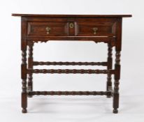 Charles II oak side table, circa 1680, the rectangular top above a single frieze drawer with two