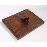 Unusual carved fruitwood sundial, with a moon and stars above signs of the Zodiac and two carved