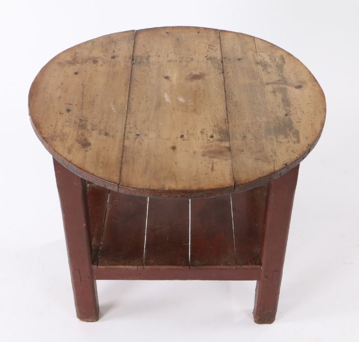 19th Century Irish Tavern table, the circular pine top above a red painted base and plank bottom, - Image 2 of 2