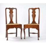 Pair of Queen Anne country made oak chairs, the arched top rail above the splat back on a rush