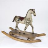 19th Century English toy rocking horse, circa 1870, dapple colour with a leather saddle raised on