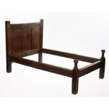 Early 17th Century English oak bed, circa 1600/1620 and later, the thumb moulded head board with