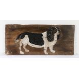 Charming Folk Art painted panel, of a black and white King Charles Spaniel, 61cm x 26cm