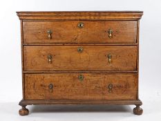 English oak and fruitwood inlaid chest of drawers, circa 1700/1720 the rectangular top above a