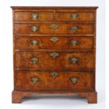 George I walnut tall chest of drawers, the rectangular top with box wood stringing above two short