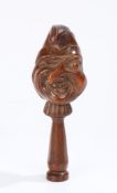 18th Century English yew wood grotesque face nutcracker, having a twisted face and projecting nose