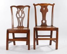 Two 19th Century Country made chairs, the first in ash and elm with a undulating back and shaped