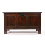 Charles I oak coffer/chest, circa 1630, the hinged rectangular top with three panels, opening to