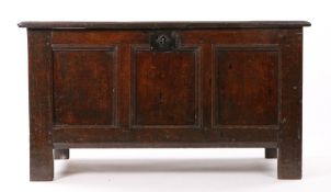 Charles I oak coffer/chest, circa 1630, the hinged rectangular top with three panels, opening to