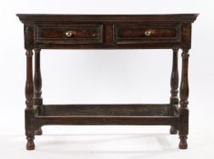 Queen Anne oak side table, circa 1700, the long rectangular top above two frieze drawers above