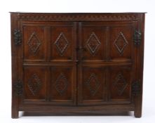 Charles I oak food cupboard, West Country, circa 1640, the rectangular top above thumb moulded