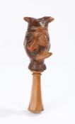 18th Century English yew wood grotesque face nutcracker, with a dual face showing a figure with an