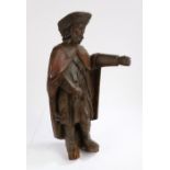 Late 15th century figure of St Roche, in original polychrome, the standing figure with a