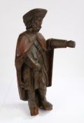 Late 15th century figure of St Roche, in original polychrome, the standing figure with a