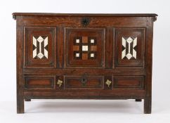 Charles II small oak coffer with drawer, circa 1660, Home Counties/ East Anglian, the boarded top