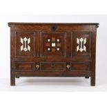 Charles II small oak coffer with drawer, circa 1660, Home Counties/ East Anglian, the boarded top