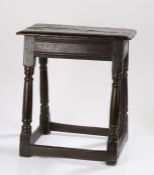 Charles I oak joint stool, circa 1640, the rectangular top above a carved frieze and angled turned