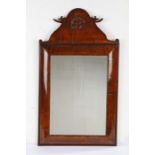 William and Mary walnut crested cushion-framed mirror, circa 1690, veneered on a deal carcass,
