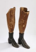 Pair of Victorian Shop window display iron boots, with card legs inserted in to the boots, the