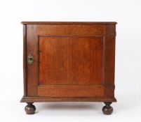 Small William and Mary oak and elm enclosed chest, the rectangular top above a single panel door