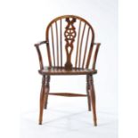19th Century Thames Valley fruit wood and elm Windsor chair, the arched back with a wheel to the