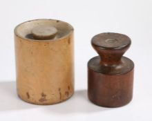 Two English 19th Century treen pie moulds, the first with a sunken handle and cylinder body, 17.