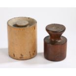 Two English 19th Century treen pie moulds, the first with a sunken handle and cylinder body, 17.