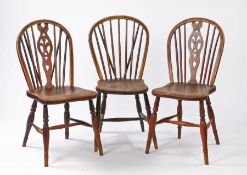 Two 19th Century Thames Valley chairs, with fleur-di-lis to the back in fruit wood above solid elm