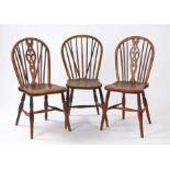 Two 19th Century Thames Valley chairs, with fleur-di-lis to the back in fruit wood above solid elm