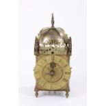 18th Century brass lantern clock, of large proportions, the finial top above four brass arched