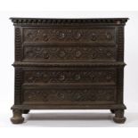 17th Century and later oak chest, the rectangular top above four long flower head carved drawers