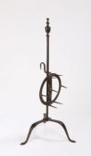 Late 18th Century wrought iron lark spit, the finial above a stem and adjustable circular pronged