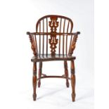 19th Century oak elm and yew Lincolnshire Windsor chair, the arched back with spindles and shaped