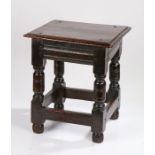 Charles I oak low stool, circa 1640, the rectangular top above a moulded frieze on baluster legs