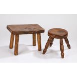 Two 19th Century elm and oak topped milking stools, the circular elm example raised on four turned