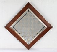 19th Century reverse mirror in the form of a chess/games board, the chequer board with a black rim