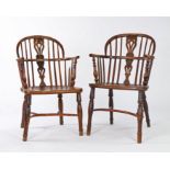 Near pair of fruitwood and elm Windsor armchairs, the arched backs with a shaped and pierced splat