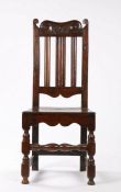 Late 17th Century oak slat back chair, circa 1690, with a scroll and arched top rail above three