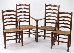 Set of four George III Lancashire chairs, circa 1770-1820, with stylised low heart splats above rush