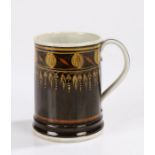 George III Mocha ware mug, circa 1800, the cylindrical mug with a brown body with berry and drop