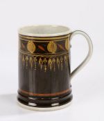 George III Mocha ware mug, circa 1800, the cylindrical mug with a brown body with berry and drop