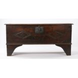 Queen Anne oak chest/coffer, the rectangular hinged top enclosing a candle box, the front panel