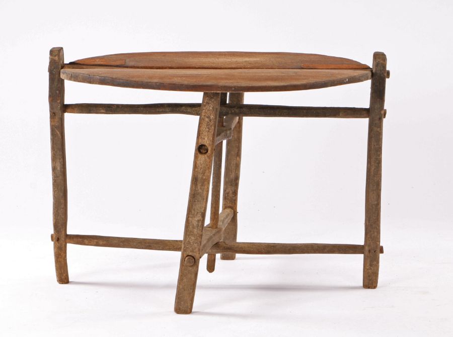 French 19th Century folding Vendange (wine) or coaching table, of small proportions, the circular