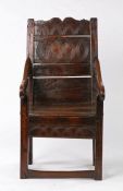 Charles II oak panel-back open armchair, Welsh, circa 1670, the back formed from two panels, the