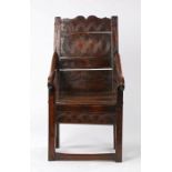 Charles II oak panel-back open armchair, Welsh, circa 1670, the back formed from two panels, the