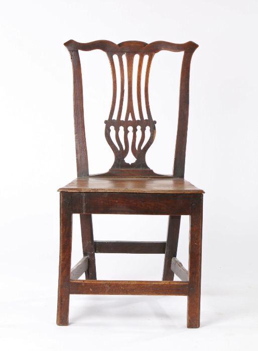George III country made oak chair, with an undulating top rail above the pierced splat and solid