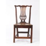 George III country made oak chair, with an undulating top rail above the pierced splat and solid