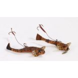 Two charming Folk art fishing lures, as minnows with painted bodies and leather tail fin, 8cm